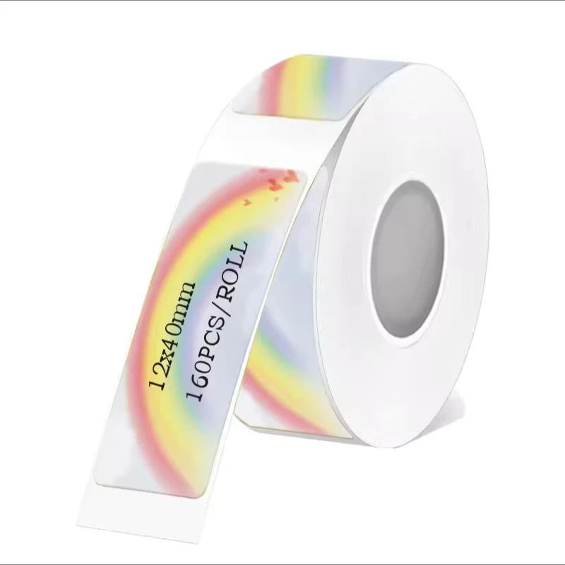 Rouleau d'étiquettes blanches traversées d'un arc-en-ciel pastel, format 12x40 mm, 160 pièces par rouleau