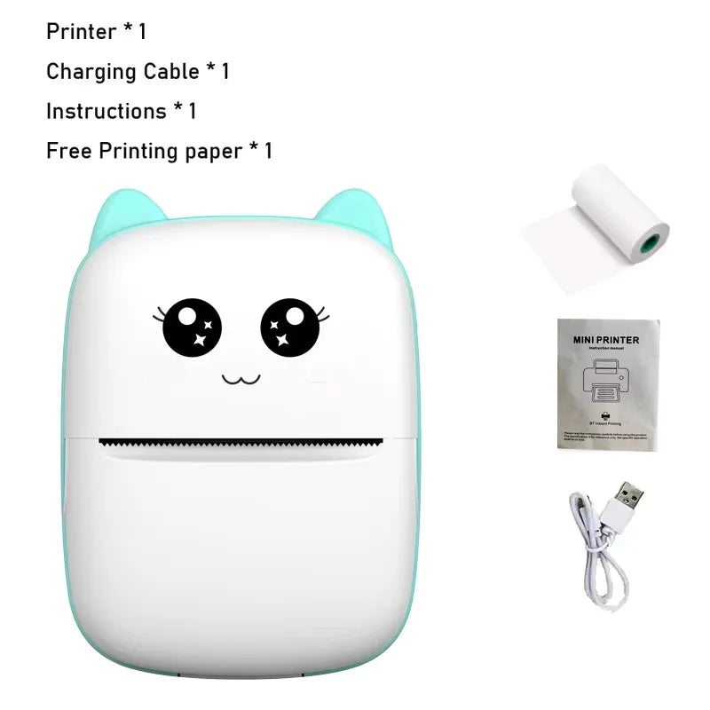 Contenu du coffret : imprimante à oreilles menthe, rouleau de papier, notice et câble de charge