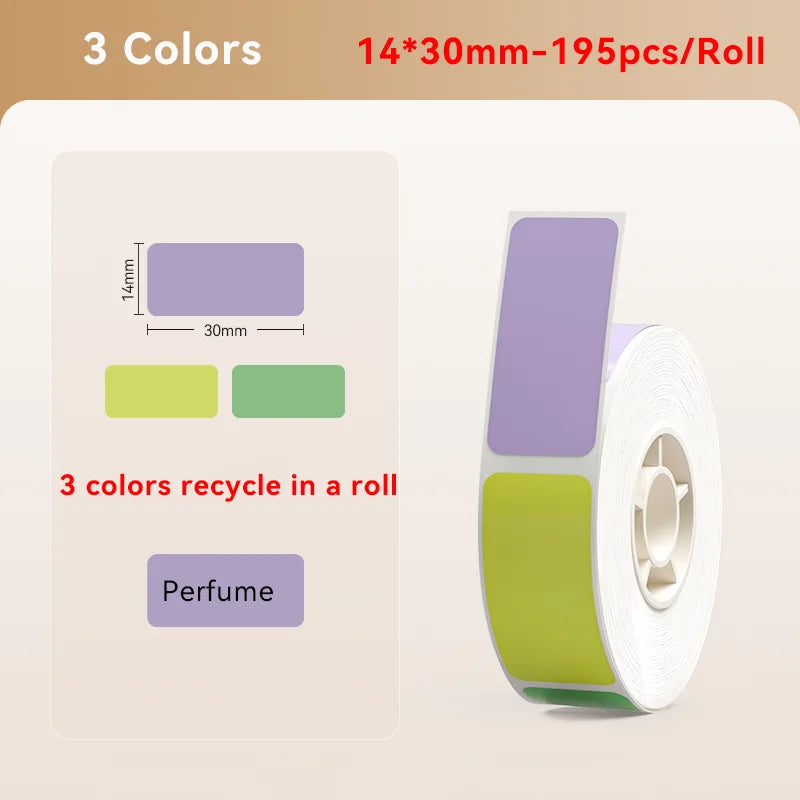 Rouleau tricolore d'étiquettes 14 x 30 mm violet, vert anis et vert, avec un exemple imprimé Perfume