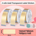 Trois rouleaux d'étiquettes transparentes dorées, format 14 x 40 mm, 160 pièces par rouleau