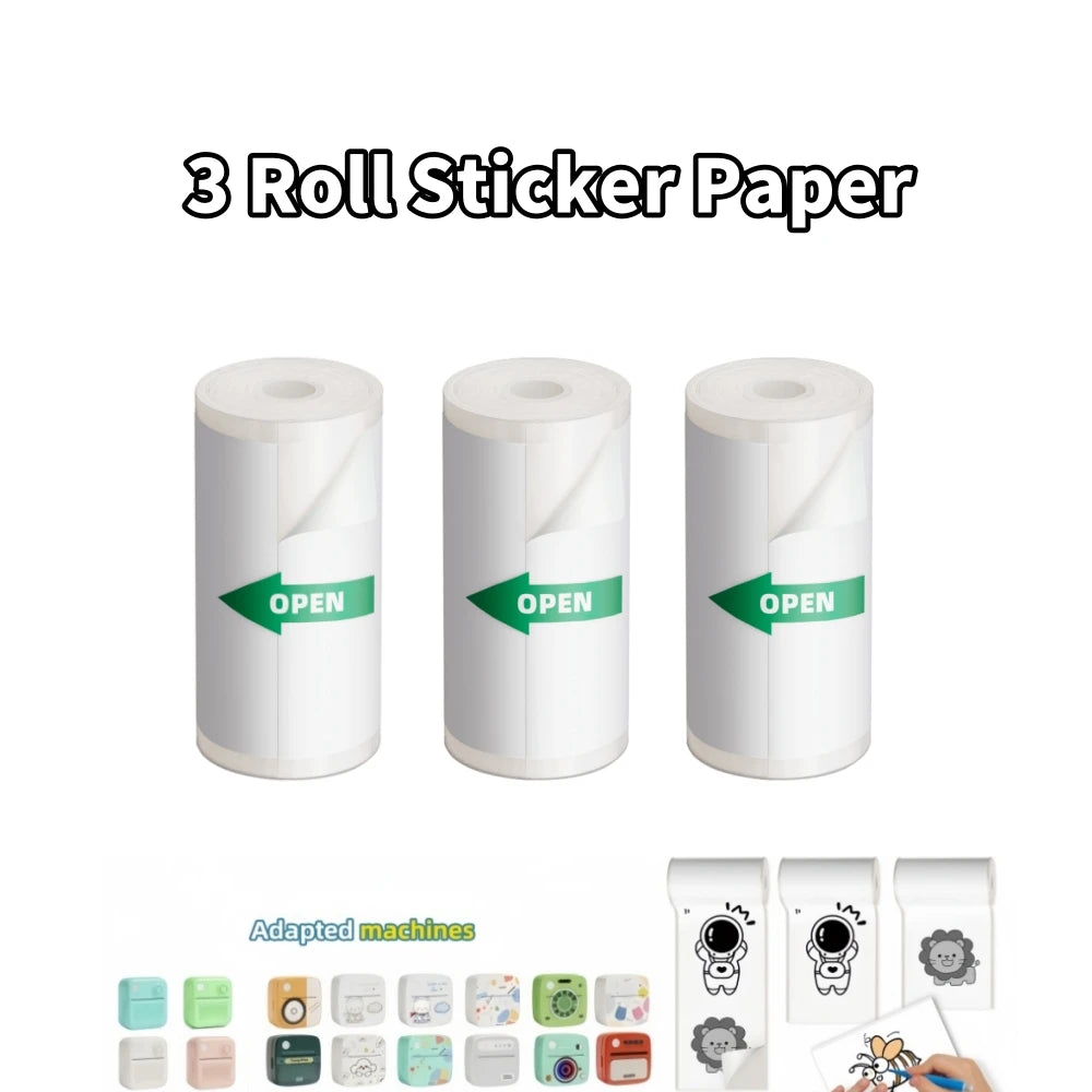 Trois rouleaux de papier autocollant marqués OPEN, bandeau des imprimantes compatibles et échantillons imprimés d'astronaute et de lion