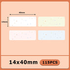 Quatre étiquettes 14 x 40 mm blanche, jaune, rose et bleue semées d'étoiles, lot de 115 pièces