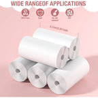Rouleaux de papier thermique empilés sur fond rose, largeur indiquée 5,7 cm, sans encre nécessaire