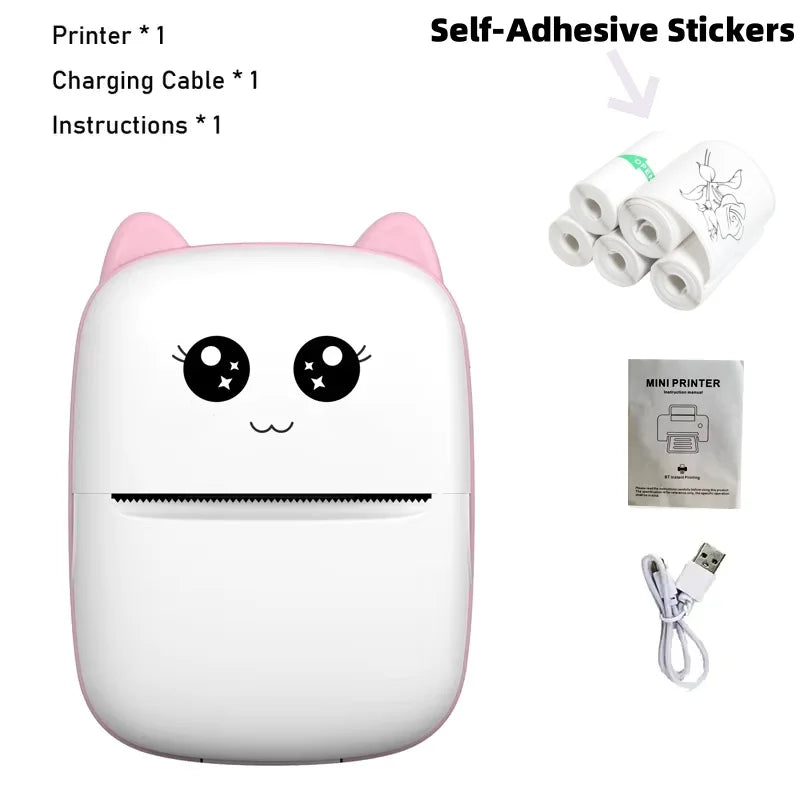 Coffret de l'imprimante chat rose avec un lot de rouleaux d'étiquettes autocollantes, la notice et le câble USB