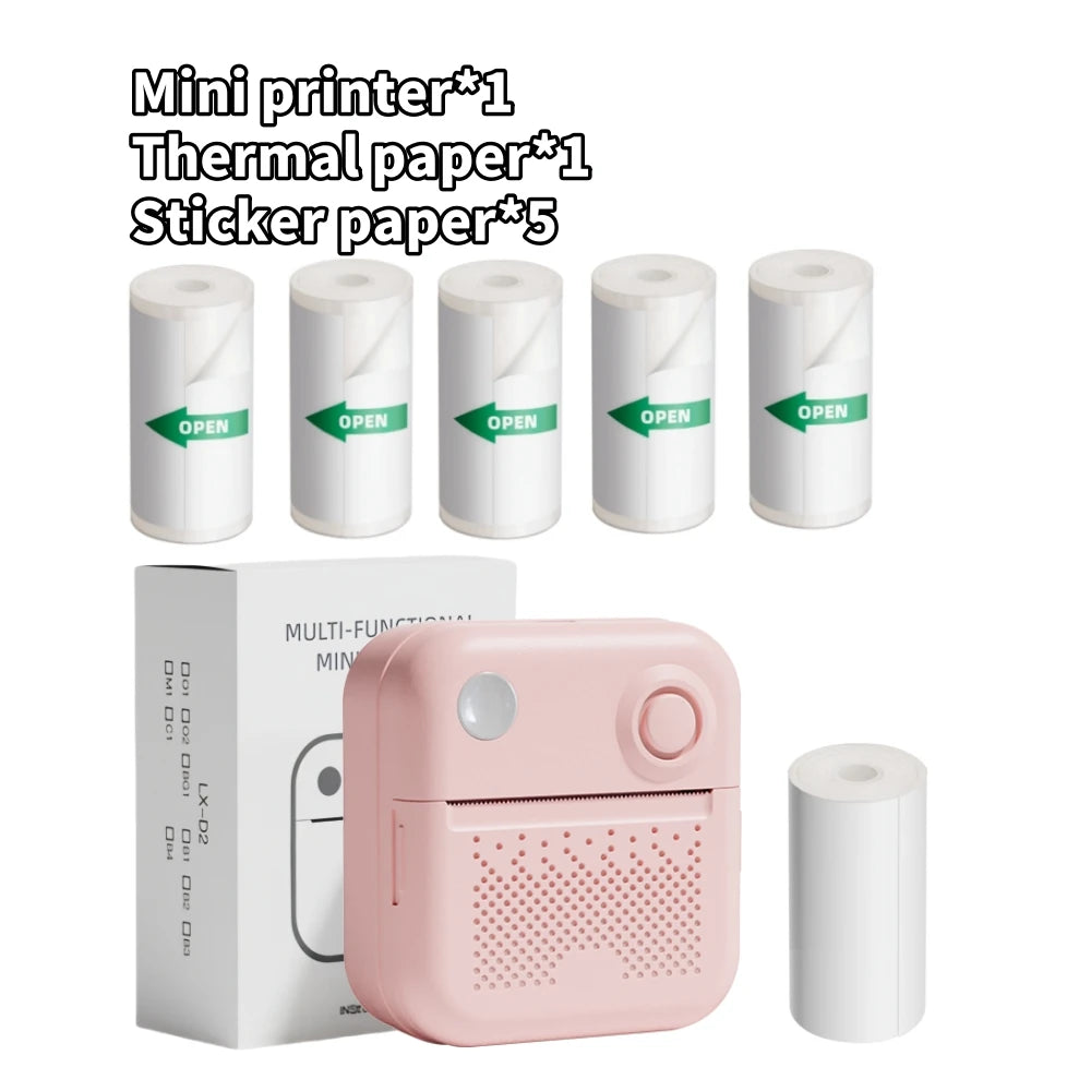 Lot imprimante rose avec sa boîte, un rouleau de papier thermique et cinq rouleaux d'autocollants