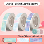 Trois rouleaux d'étiquettes aquarelle vert, rose et violet galaxie, format 12 x 40 mm, 160 pièces par rouleau
