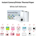 Boîte de papier thermique blanc auto-adhésif, trois rouleaux à côté et grille des appareils compatibles