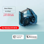 Cassette de ruban carbone noir de 16 m, avec deux étiquettes blanches imprimées en caractères cyrilliques