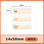 Trois étiquettes plage à la noix de coco, à l'étoile de mer et au crabe, format 14x50 mm, lot de 90 pièces