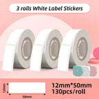 Trois rouleaux d'étiquettes blanches avec le schéma du format 12 x 50 mm, 130 pièces par rouleau