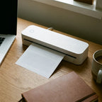 Imprimante thermique A4 sans encre en télétravail sur un bureau à domicile