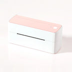 Imprimante d'étiquettes d'expédition blanche à capot rose, vue de trois quarts sur fond rose pâle