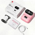 Imprimante thermique portable rose avec rouleau de papier thermique, notice et câble USB